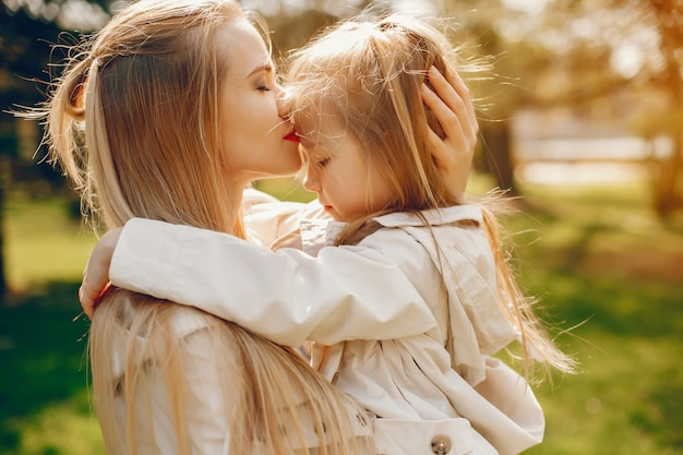 Elegant mother with cute daughter | Free Photo