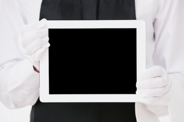 Download Free Photo | Elegant waiter holding tablet mock-up