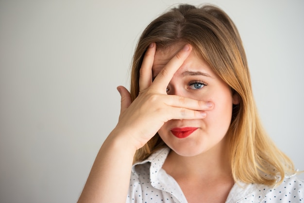 Premium Photo | Embarrassed displeased woman feeling ashamed