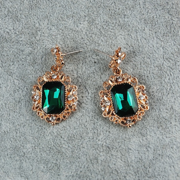 Premium Photo | Emerald earrings