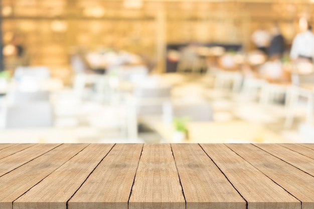 Premium Photo | Empty brown wood table top on blurred background at ...