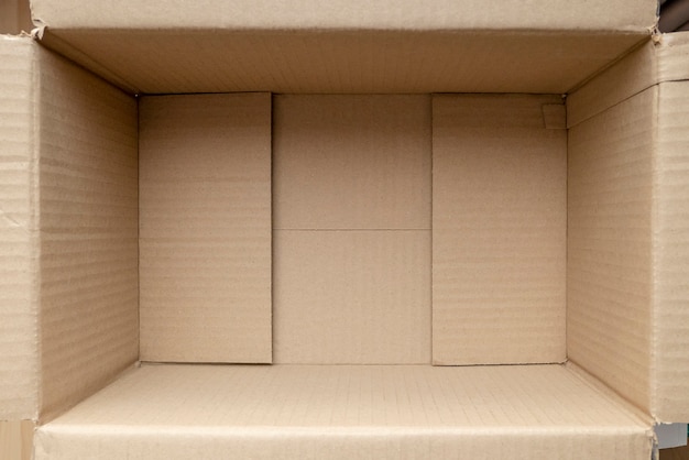 empty-cardboard-box-close-up-inside-view-cardboard-packaging-box_64749-1329.jpg