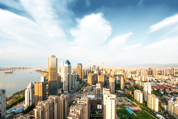 Premium Photo | Empty floor with modern skyline and buildings