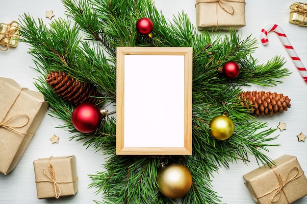 Premium Photo | Empty frame on christmas decorations