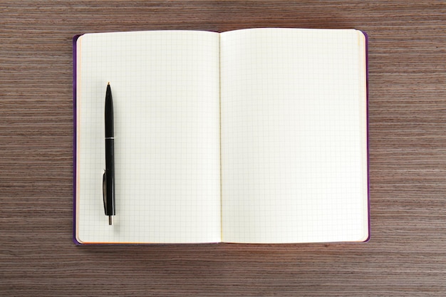 Premium Photo | Empty notebook with pen on table. job interview concept