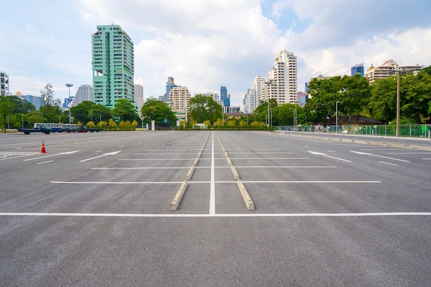 Premium Photo Empty Parking Lot With City In The Background And