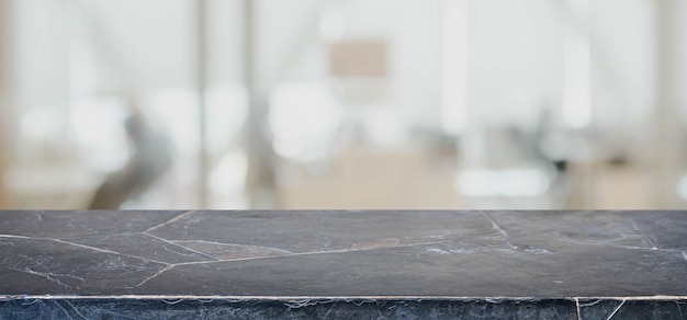 Premium Photo | Empty stone marble table top and blurred abstract