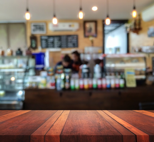 Premium Photo | Empty table surface with blurred blackground for ...