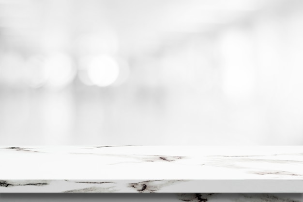 Download Premium Photo | Empty white marble table over blur store background, product display montage