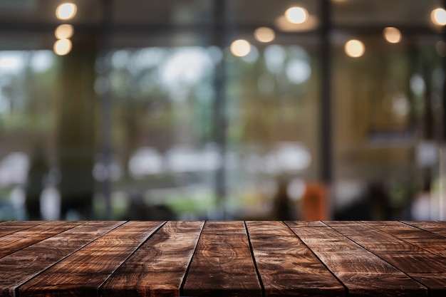 Premium Photo | Empty wood table top on abstract blurred restaurant and