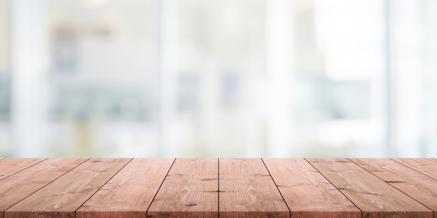 Premium Photo | Empty wood table top and blurred abstract restaurant ...