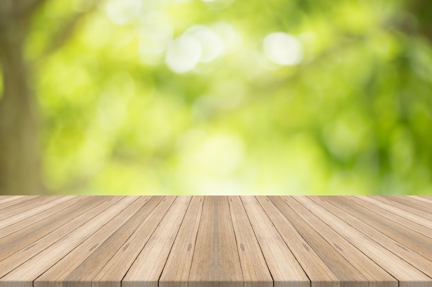 Empty wood table top on blurred abstract green background,Free space ...