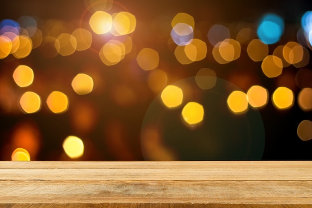 Premium Photo | Empty wooden shelves on blur bokeh background