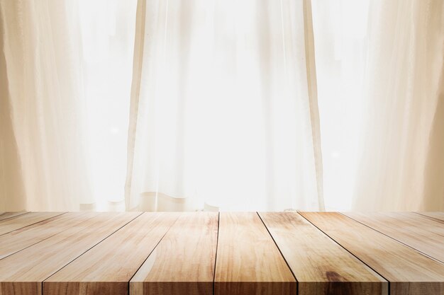 Premium Photo | Empty wooden table platform and bokeh at night.