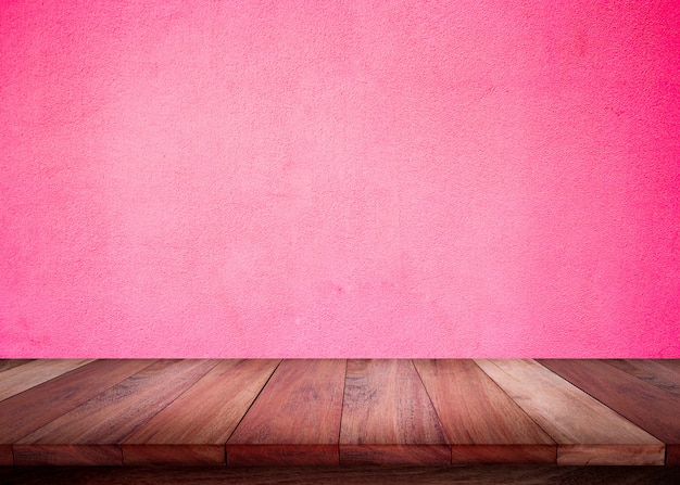 Premium Photo | Empty wooden table with pink wall background