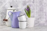 Premium Photo Enamel Mugs And Jug Near Hyacinth