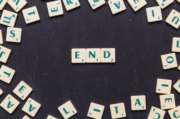 free-photo-end-scrabble-letters-arranged-over-black-backdrop