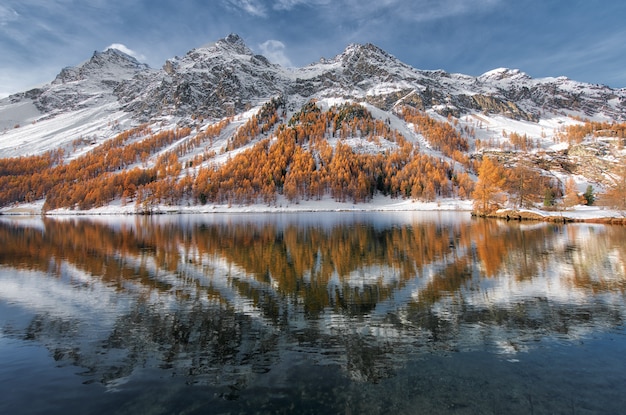 Premium Photo | Engadine valley in switzerland. autumn reflection in ...