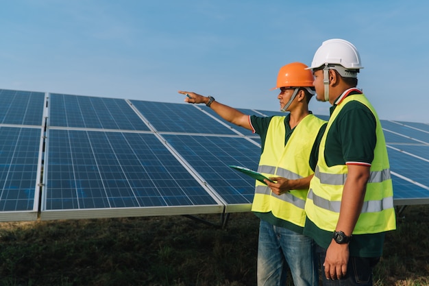 premium-photo-engineer-inspect-solar-panel-at-solar-power-plant