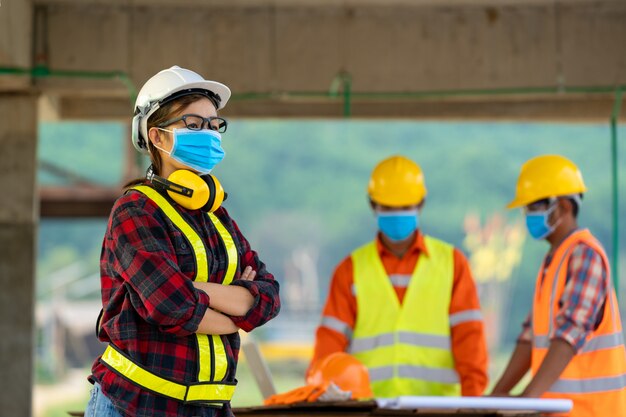 Premium Photo | Engineer wearing protective mask to protect against ...