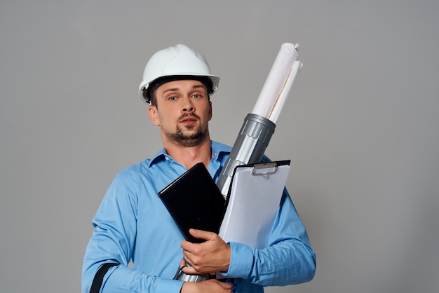 Premium Photo | Engineer with drawings in hand hand gesture light ...