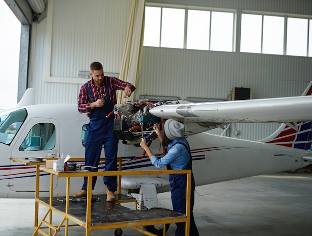 Free Photo Engineer Working With A Airplane