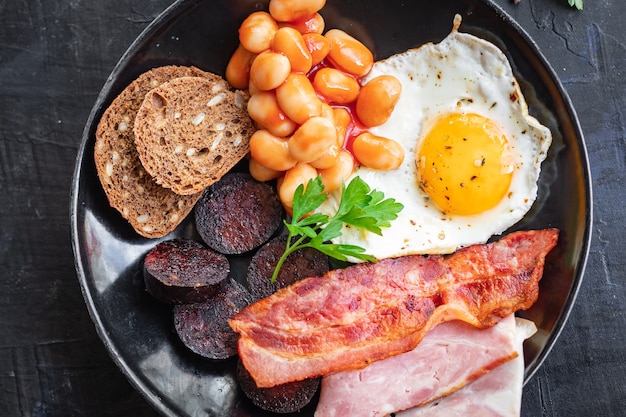 Premium Photo  English breakfast fried egg black pudding blood 