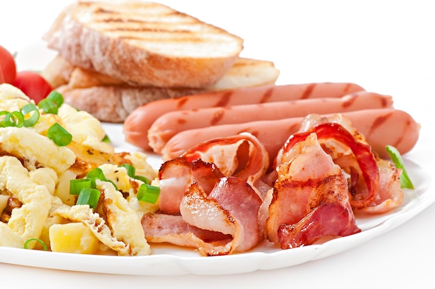 Free Photo English Breakfast Scrambled Eggs Bacon Sausage And Toast