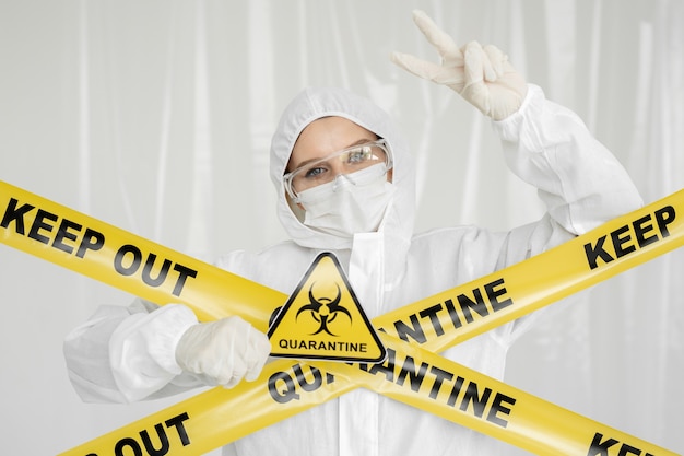 Premium Photo | Epidemiologist woman in protective clothing is in a ...