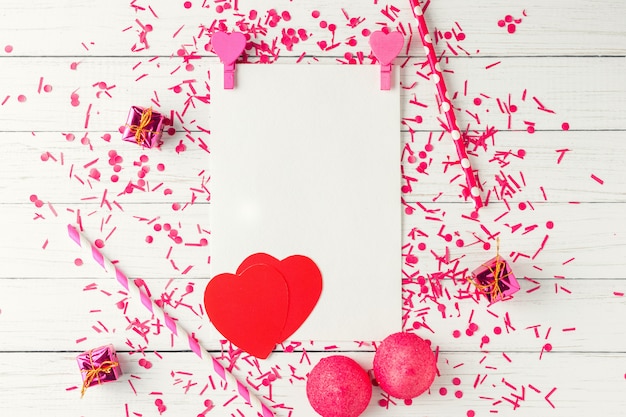 Epty White Paper Sheet With Confetti And Valentines Decorations On