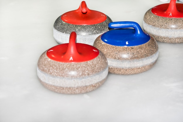 Premium Photo | Equipment for curling sport game the ice