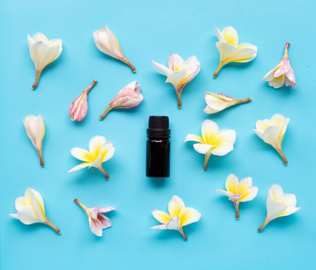 Premium Photo Essential Oil With Plumeria Or Frangipani Flower