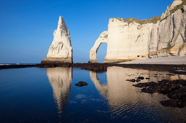 Premium Photo | Etretat aval cliff, rocks and natural arch landmark and ...