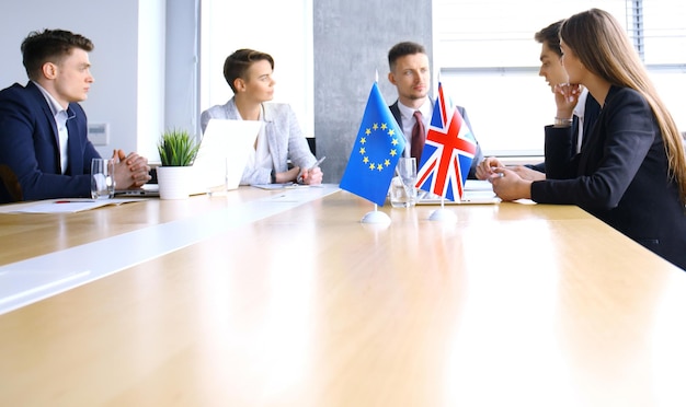 Premium Photo | European union and united kingdom leaders shaking hands ...