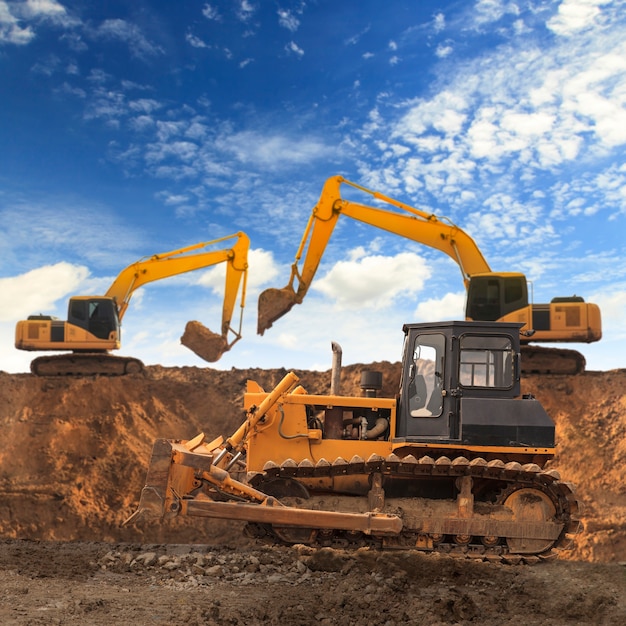 Excavator And Grader Premium Photo