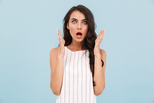 Premium Photo | Excited shocked young woman posing isolated wall.