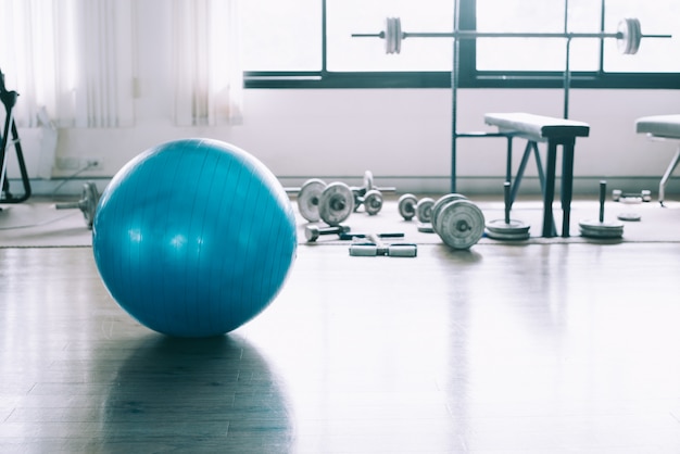 Premium Photo | Exercise blue color ball in fitness, gym equipment in ...