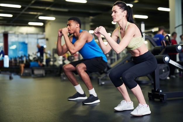 Premium Photo | Exercising in sports center