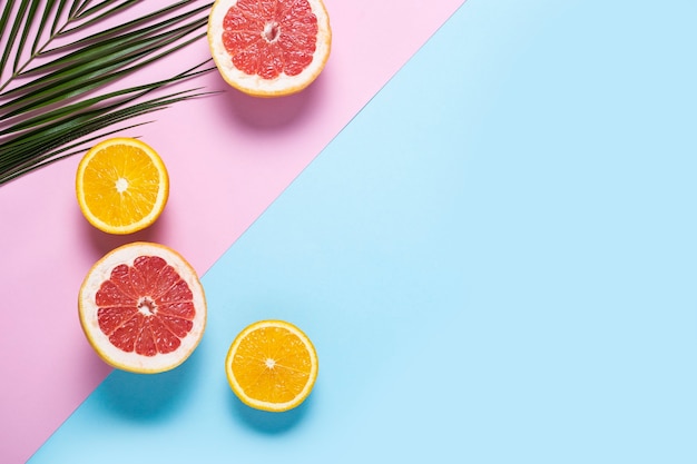 Premium Photo | Exotic fruits on a blue pink background. coconut