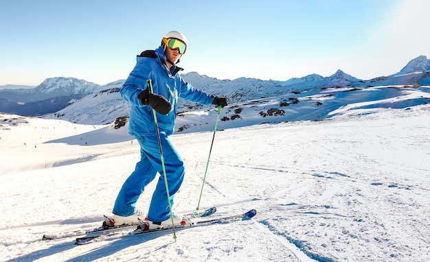 Premium Photo Expert Skier On Blue Uniform On Relax Moment At French Alps Ski Resort