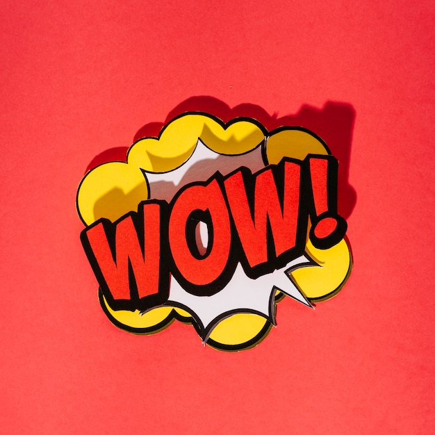 Expression text wow in the center of speech bubble on red background