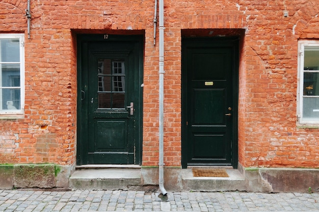 Exterior Of House With Black Doors Photo Free Download