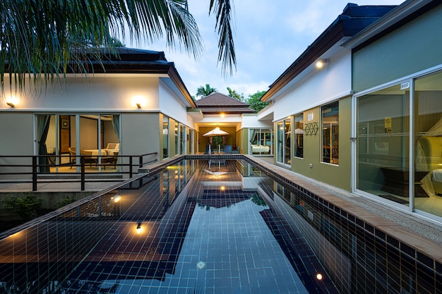 Premium Photo | Exterior modern tropical villa with swimming pool