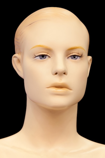 Premium Photo | Face of a mannequin isolated on black background