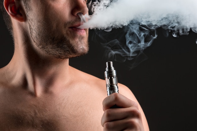 Free Photo | The face of vaping young man