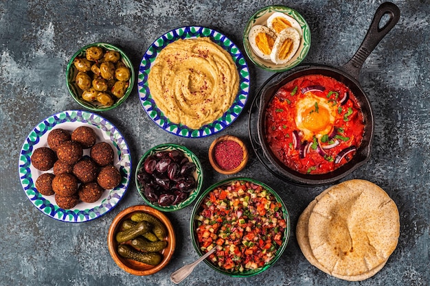 Premium Photo | Falafel, hummus, shakshuka, israeli salad - traditional ...