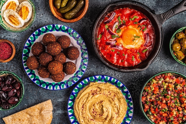 Premium Photo | Falafel, hummus, shakshuka, israeli salad - traditional ...