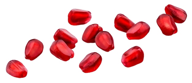 Falling pomegranate seeds isolated with clipping path Premium Photo