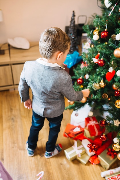 Free Photo | Family christmas scene with boy