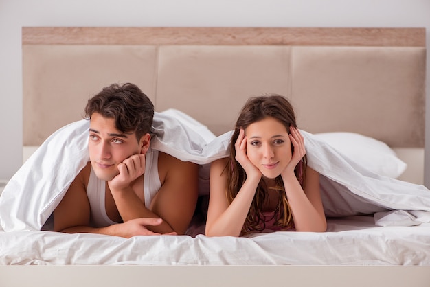 Family conflict with wife husband in bed Premium Photo